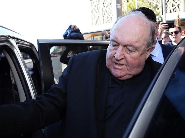 Former Australian archbishop Philip Wilson leaves a court in Newcastle on August 14, 2018. - Wilson, a former Australian archbishop convicted of concealing abuse by a notorious paedophile priest in the 1970s, was spared jail on August 14, with a court ruling he can serve his sentence in home detention. (Photo by Peter LORIMER / AFP)