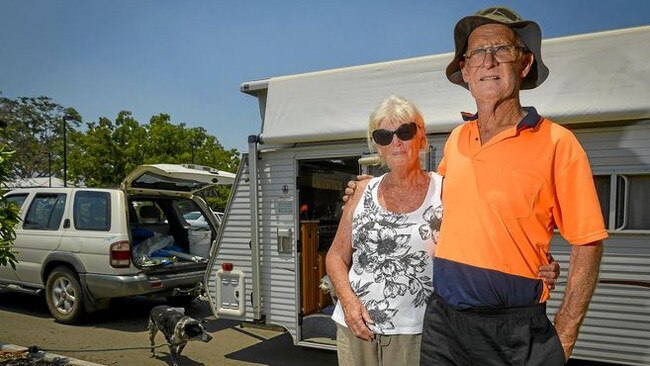 Bob and Debra Wait are living in their caravan opposite the Miriam Vale Community Centre with their two dogs after being forced to evacuate their property on Deepwater Rd. Picture: Matt Taylor