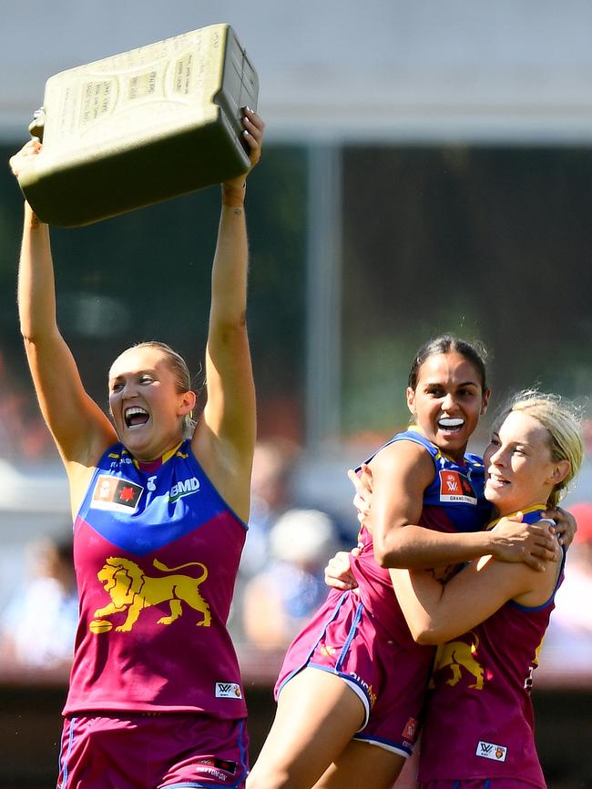 The Lions celebrate the 2023 flag. Picture: Josh Chadwick/AFL Photos/via Getty Images.