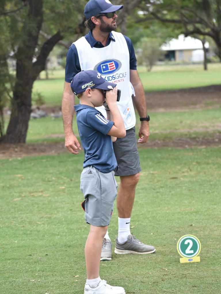 Cooroy's Archie Lethbridge (eight years boys) takes a distance measurement at the US Kids Golf Foundation Australian Open at the Rockhampton Golf Club on September 28.