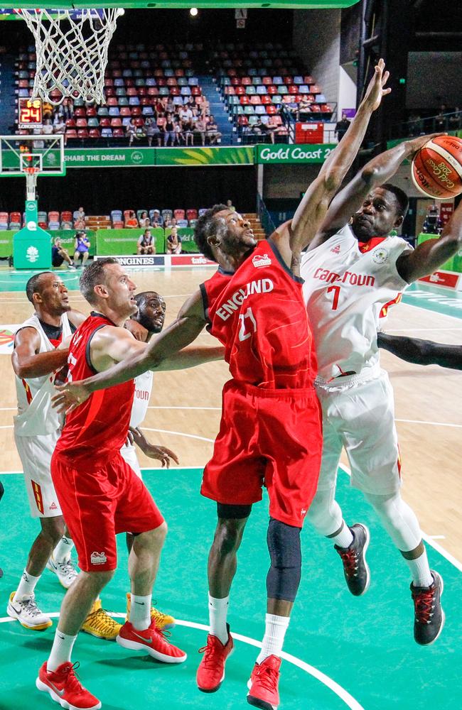 Felix Thierry Bogmis of Cameroon jumps for a shot at the hoop against England at the Townsville Entertainment Centre on April 7, 2018. The basketball team have reportedly flown home to Cameroon. Picture: Michael Chambers