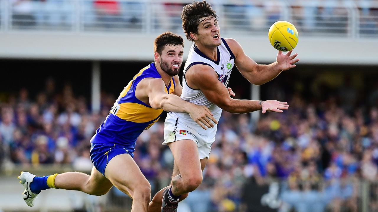 Lachie Schultz bobbed up for the Dockers. Pictures: AFL Photos/Getty Images