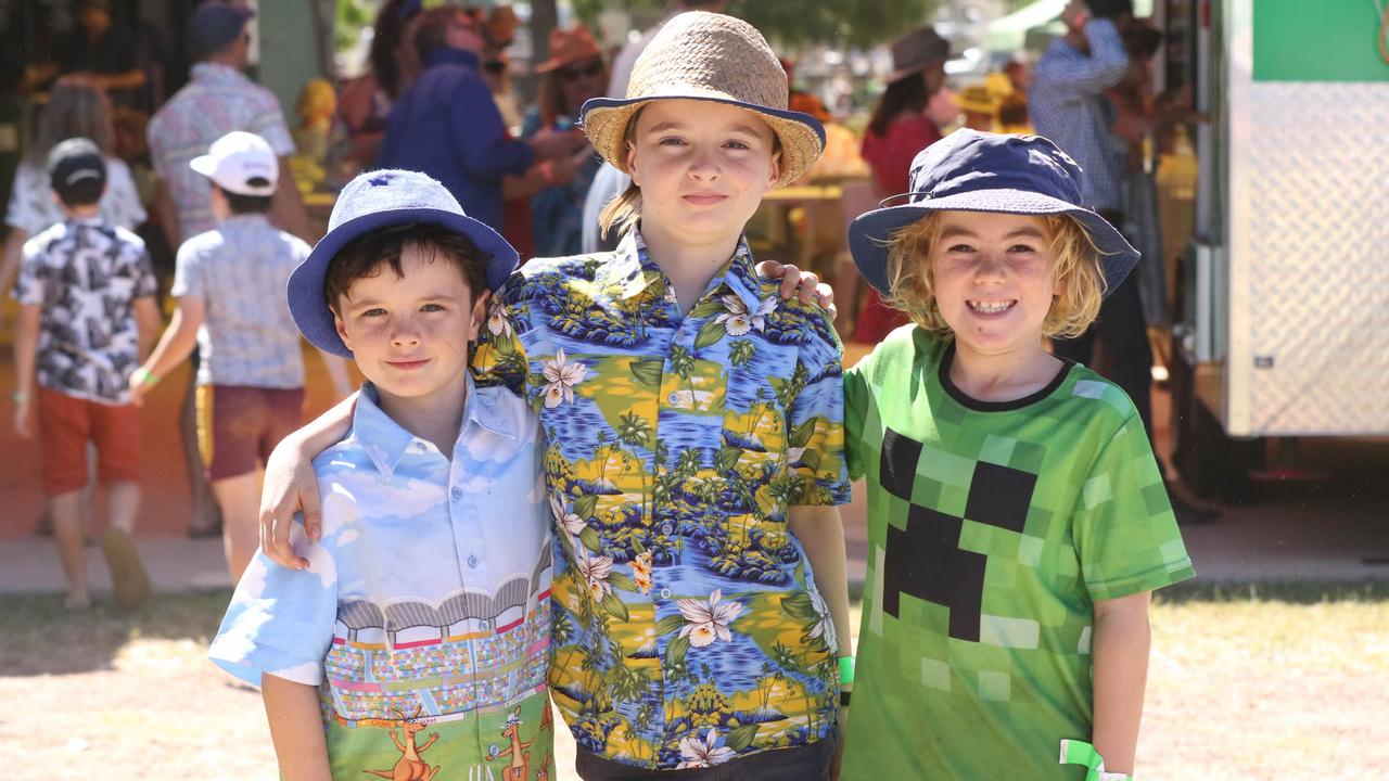 Zac Small, Oscar Small and Harry Collins at the 2021 Adelaide River Races. Picture: Glenn Campbell