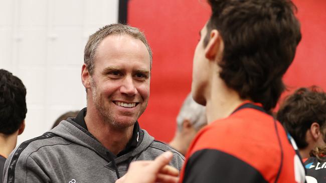 Coach Ben Rutten congratulates Brandon Zerk-Thatcher. Picture: Michael Klein