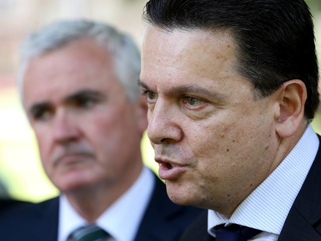 Independent Member for Denison, Andrew Wilkie, left, and Senator Nick Xenophon giving a press conference on the sale of VDL Co. at Parliament House lawns in Hobart. Picture: SAM ROSEWARNE