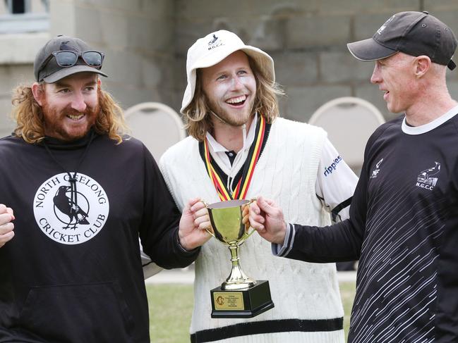Coaches Jack Hall and Craig Biddiscombe flank skipper Tom Mathieson. Picture: Mark Wilson