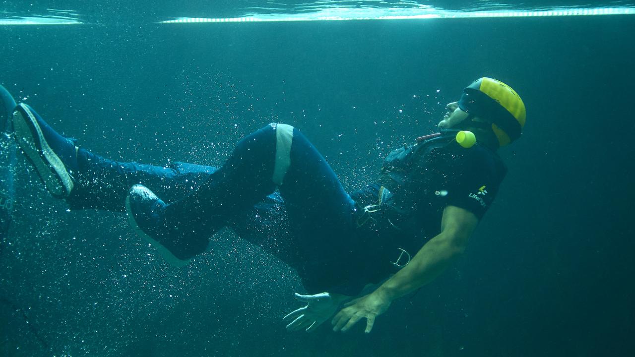 A LifeFlight doctor doing underwater training.