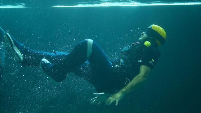 A LifeFlight doctor doing underwater training.