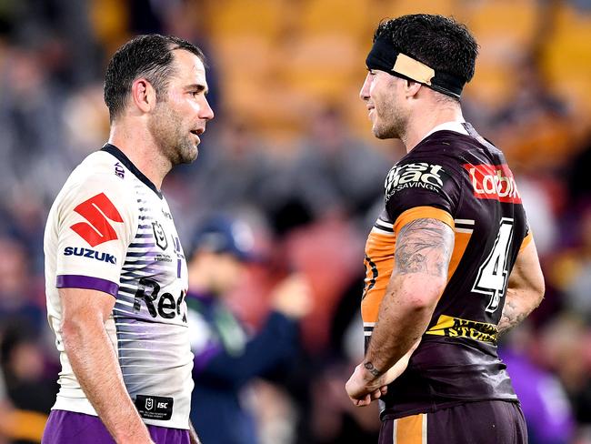 BRISBANE, AUSTRALIA - JULY 24: Cameron Smith of the Storm and Darius Boyd of the Broncos have a chat after the round 11 NRL match between the Brisbane Broncos and the Melbourne Storm at Suncorp Stadium on July 24, 2020 in Brisbane, Australia. (Photo by Bradley Kanaris/Getty Images)