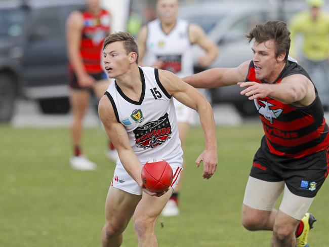 North Launceston's Jack Avent about to be tackled by Lauderdale's Haydn Smith. Picture: PATRICK GEE