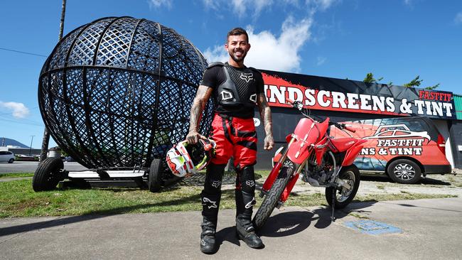 To celebrate the opening of his windscreen and tinting business, former motorcycle stunt rider Frank Rodrigues Da Silva will ride his motorbike in the Globe of Death, along with two of his mates from Hudsons Circus. The grand opening of Fastfit Windscreen and Tint on Friday will also have clowns, jugglers and animals from the circus performing at the Spence Street business. Picture: Brendan Radke