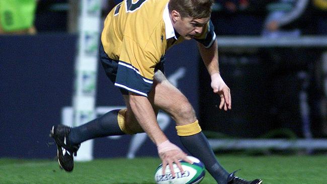 Tim Horan scores the fastest try of the tournament in 1999 against Romania.