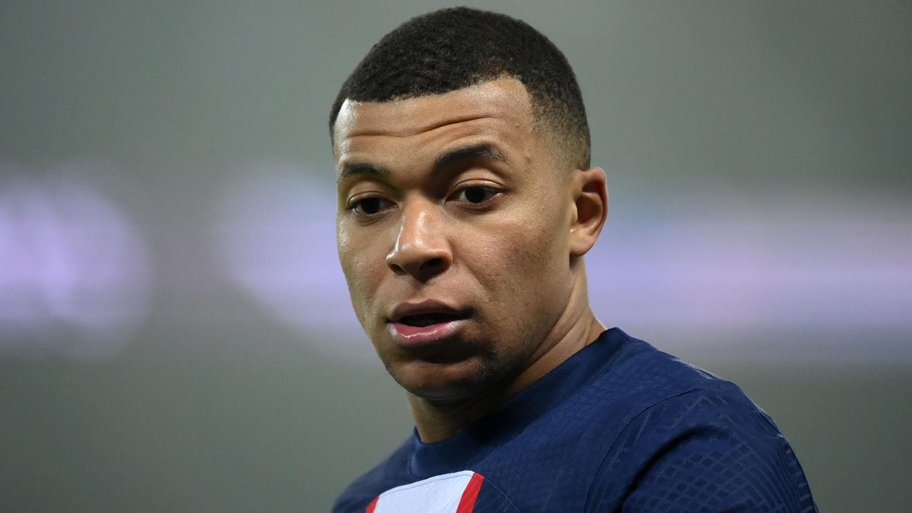 Paris Saint-Germain's French forward Kylian Mbappe reacts during the French L1 football match between Paris Saint-Germain (PSG) and Olympique Lyonnais (OL) at The Parc des Princes Stadium in Paris on April 2, 2023. (Photo by FRANCK FIFE / AFP)