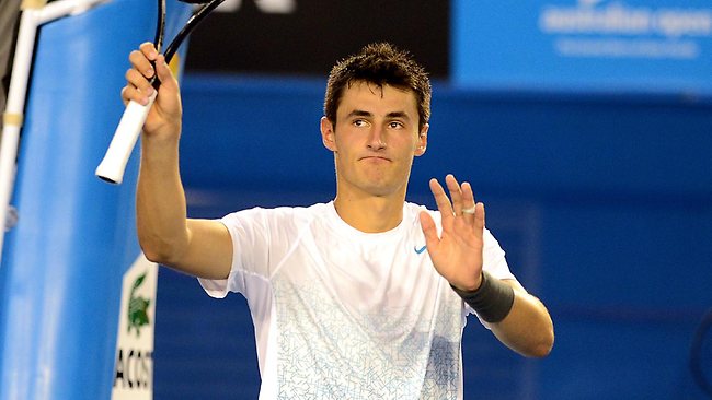 Bernard Tomic goes to the net to study Australian Open rival Daniel ...