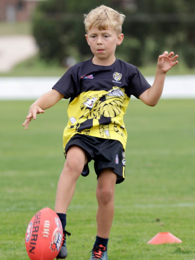 Going Tigers supporter kicks the ball during the Community Clinic at Girdlestone Park in East Devonport. Picture: Grant Viney