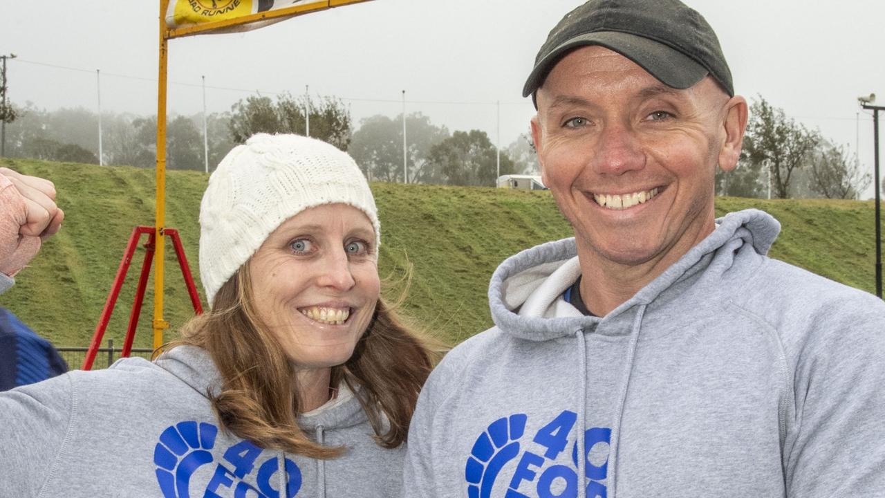 Louise Macdonald and Geordie Horn run another successful 40 for Fortey relay at Toowoomba Showgrounds. Sunday, May 29, 2022. Picture: Nev Madsen.