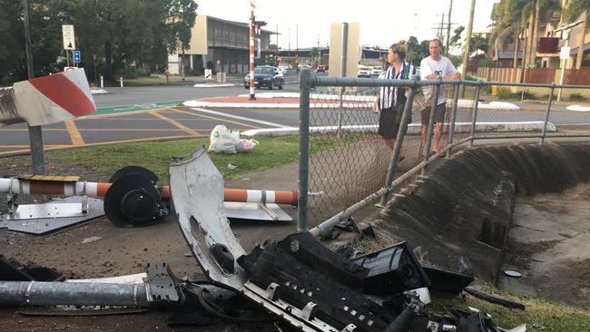 A car has rolled on its side following a collision with an oncoming Kuranda Scenic Rail train in Cairns North.