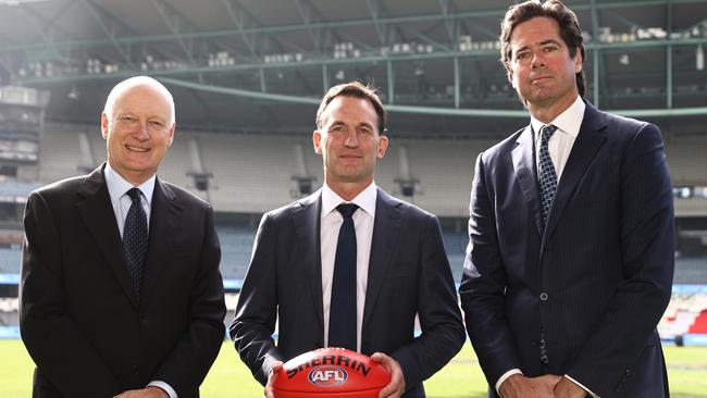 Andrew Dillon (centre) alongside AFL chairman Richard Goyder (left) and current chief executive Gillon McLachlan at the announcement of his appointment on Monday. Picture: Michael Klein