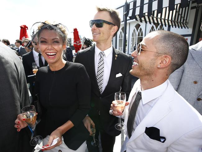 Kim Johnson with Tim Campbell and Anthony Callea in the Birdcage at Derby Day 2014. Picture: Bradley Hunter