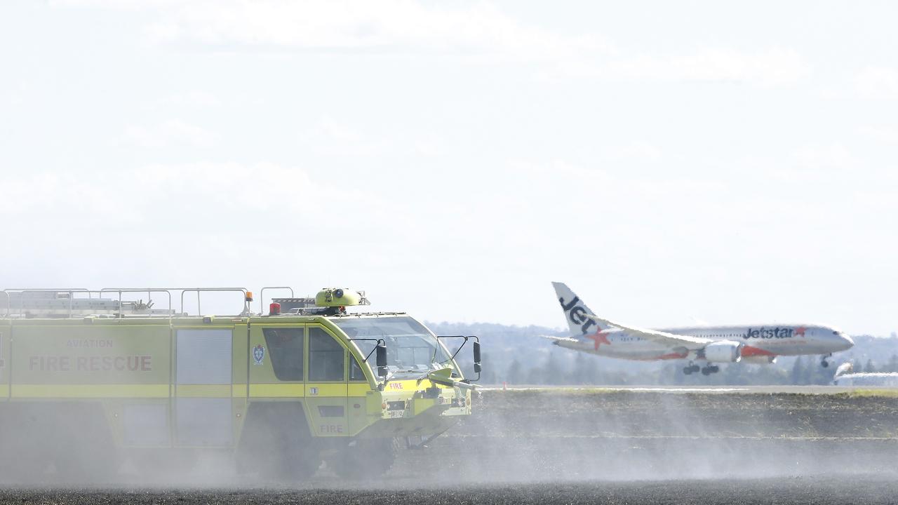 Aviation fire trucks brought the fire under control. Picture: NewsWire / John Appleyard