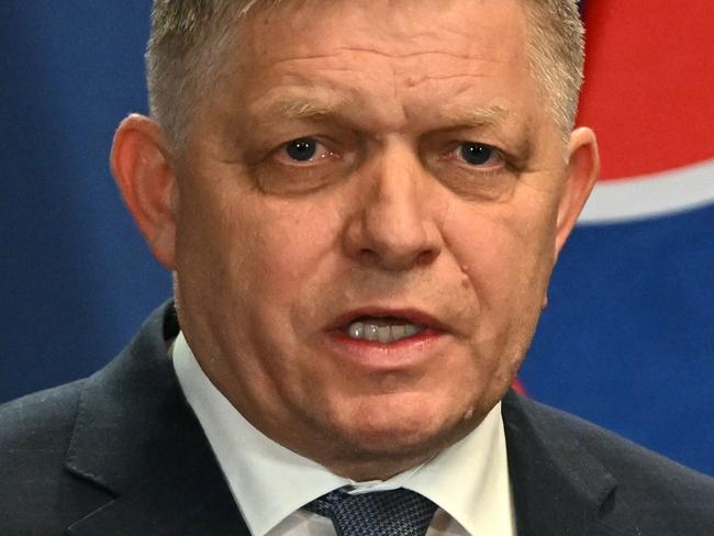 (FILES) Slovakia's Prime Minister Robert Fico gestures as he addresses a press conference with his Hungarian counterpart at Carmelita monastery in Budapest on January 16, 2024. Slovak Prime Minister Robert Fico was on May 15, 2024 shot and hospitalised after a cabinet meeting in the central town of Handlova, local media said. (Photo by ATTILA KISBENEDEK / AFP)