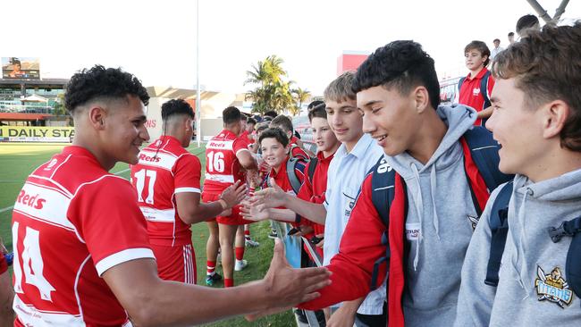 PBC’s Nona congratulated by school mates. Picture: Liam Kidston