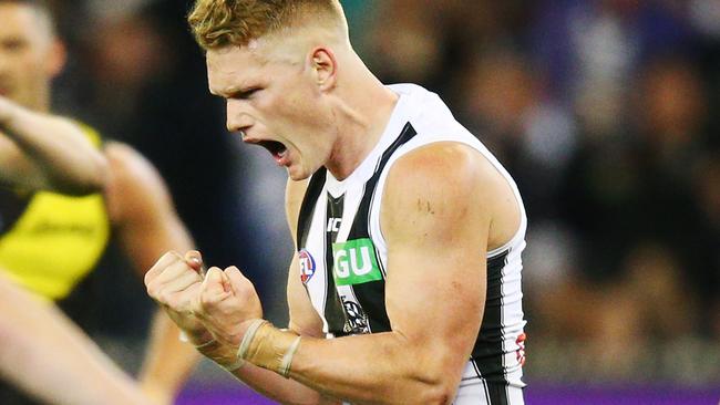 MELBOURNE, VICTORIA - SEPTEMBER 21:  Adam Treloar of the Magpies celebrates a goal during the AFL Preliminary Final match between the Richmond Tigers and the Collingwood Magpies on September 21, 2018 in Melbourne, Australia.  (Photo by Michael Dodge/AFL Media/Getty Images)