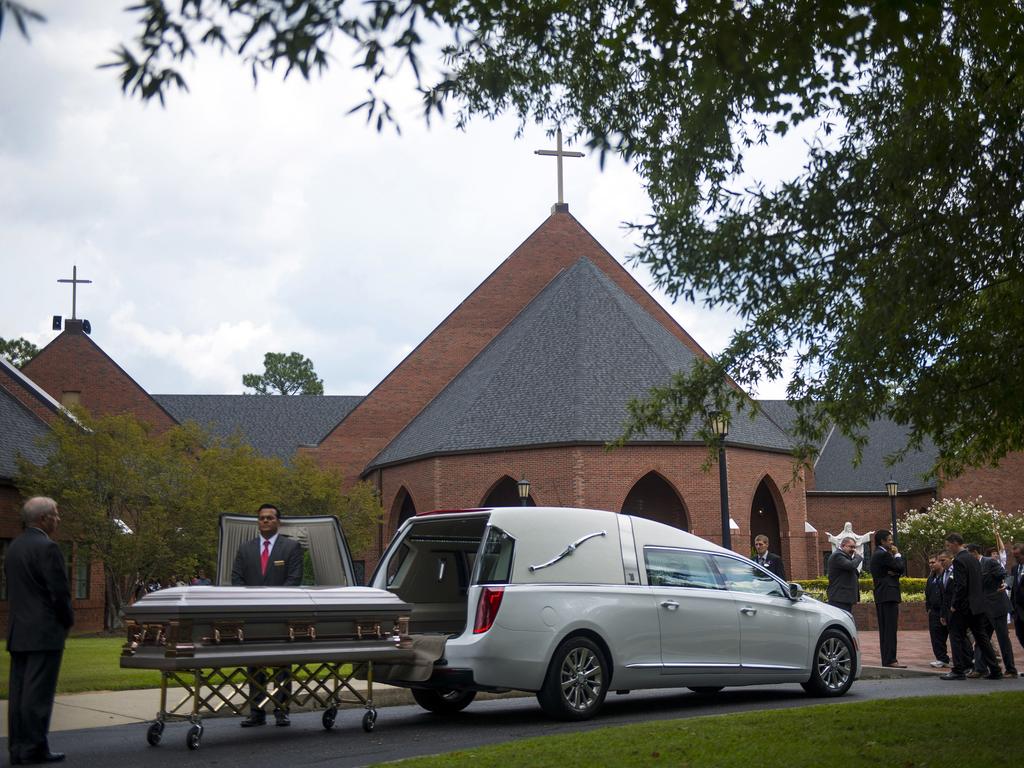 The family of Shanann Watts and her daughters Bella and Celeste approach a hearse outside of Sacred Heart Catholic Church in Pinehurst, N.C., on Saturday, Sept. 1, 2018. A funeral mass was held for Shanann and her daughters who were found dead in Colorado on Aug. 16, 2018. Picture: Melissa Sue Gerrits/The Fayetteville Observer via AP