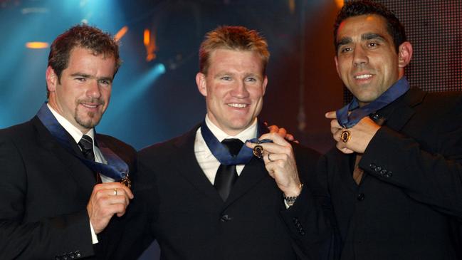 2003 Brownlow Medallists Mark Ricciuto, Nathan Buckley and Adam Goodes. Picture: Kelly Barnes