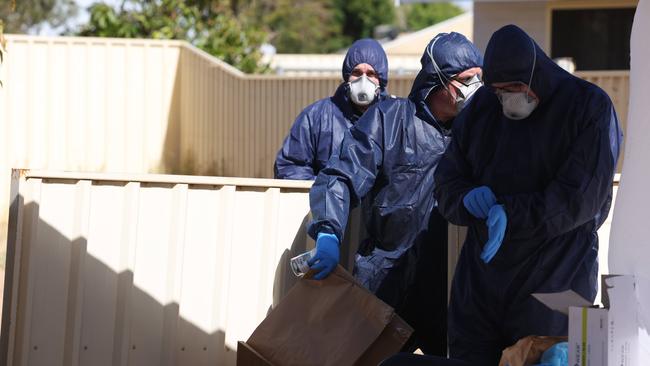 Police forensics at the house where Cleo was found. Picture: Colin Murty