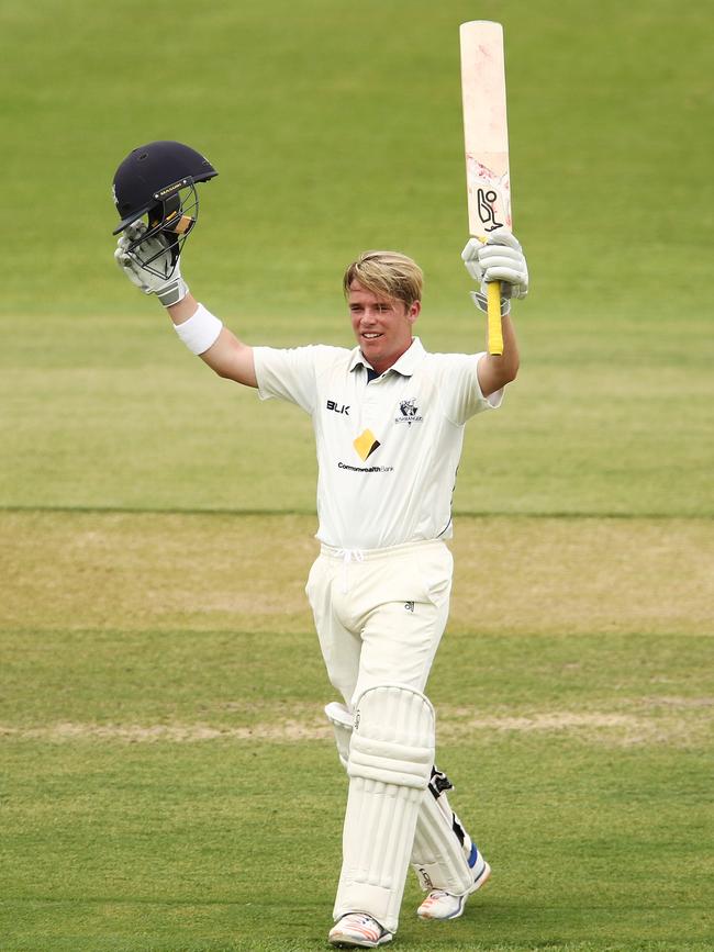 Harris celebrates his century during the 2016-17 Sheffield Shield final between Victoria and South Australia. Picture: Getty