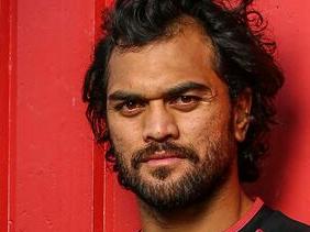 Karmichael Hunt shows off Indigenous Round jersey for Queensland Reds . Photo: Brendan Hertel, QRU