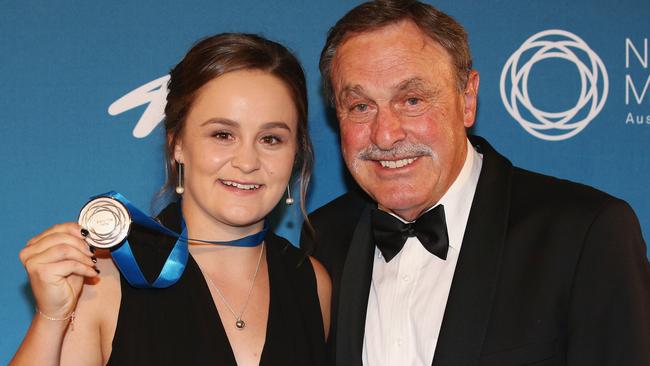 John Newcombe medallist Ashleigh Barty with John Newcombe. Photo: Getty Images