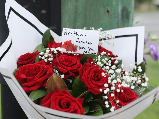 Notes and flowers at the scene. Picture: Max Mason-Hubers