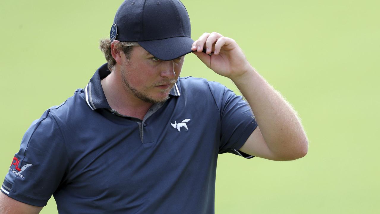 England's Eddie Pepperell reacts on the 18th green.