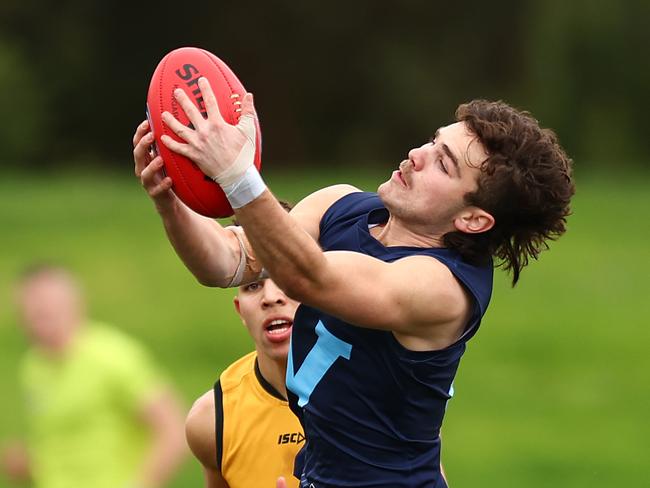 MELBOURNE, AUSTRALIA - JULY 09: Nicholas Watson of Vic Metro takes a mark during the 2023 AFL National Championships match between Vic Metro and Western Australia at RSEA Park on July 09, 2023 in Melbourne, Australia. (Photo by Graham Denholm/AFL Photos via Getty Images)