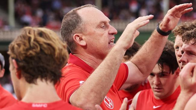 SYDNEY, AUSTRALIA - SEPTEMBER 07:  Swans head coach John Longmire speaks to players at three quarter time during the AFL First Qualifying Final match between Sydney Swans and Greater Western Sydney Giants at Sydney Cricket Ground, on September 07, 2024, in Sydney, Australia. (Photo by Matt King/AFL Photos/via Getty Images)