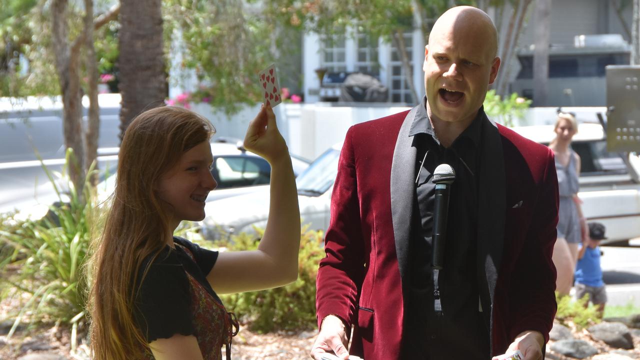 Nickelby The Magician wows the crowd with his magic tricks at the Australia Day Festival.