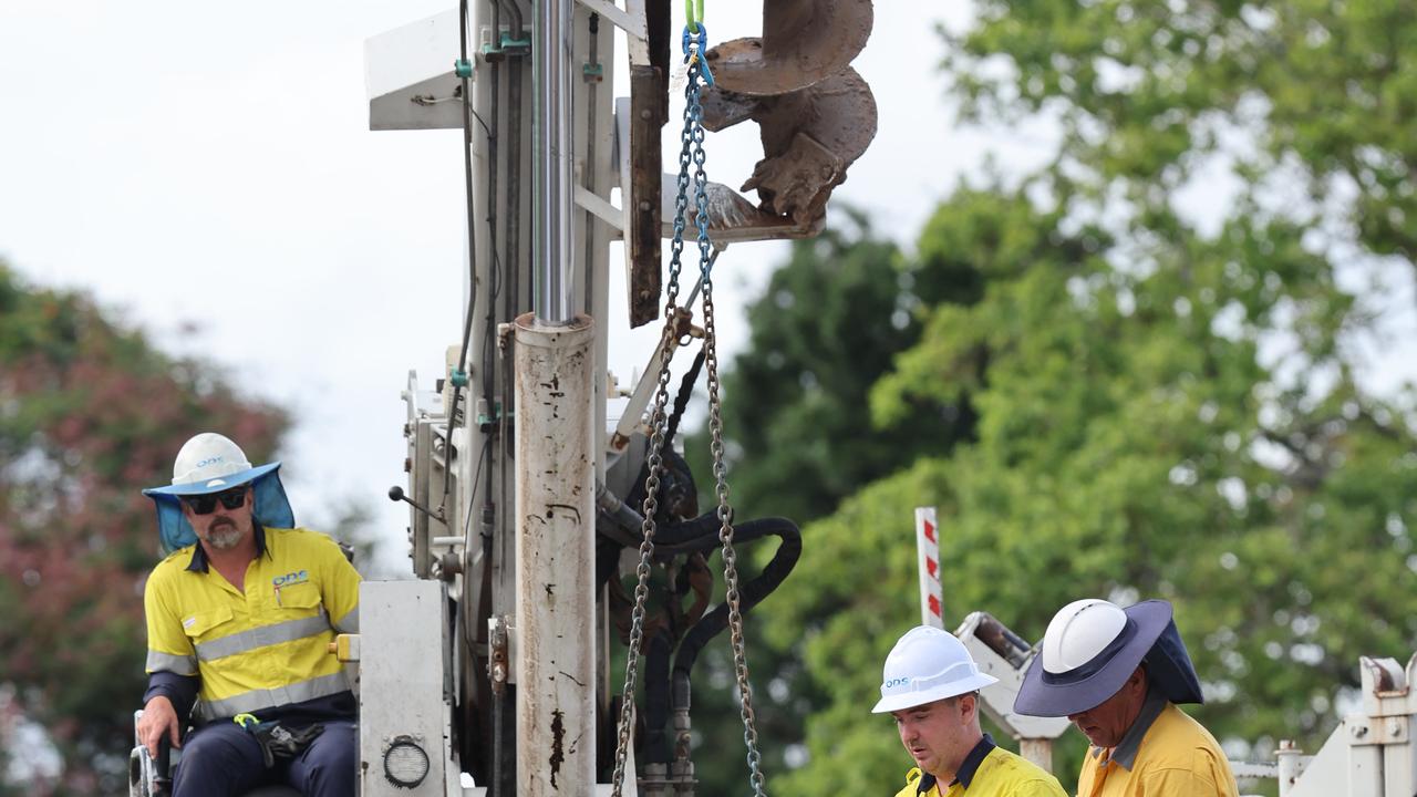 Energex workers get on with recovery efforts outside HOTA and Bundall. Picture Glenn Hampson