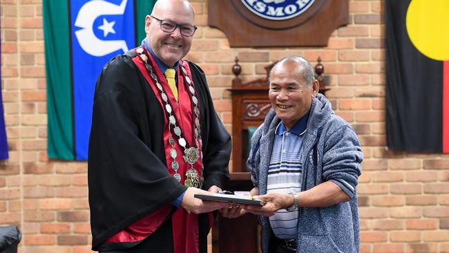 Lismore mayor Steve Krieg presents citizen certificate to Angel Abordo at council chambers in Goonellabah.