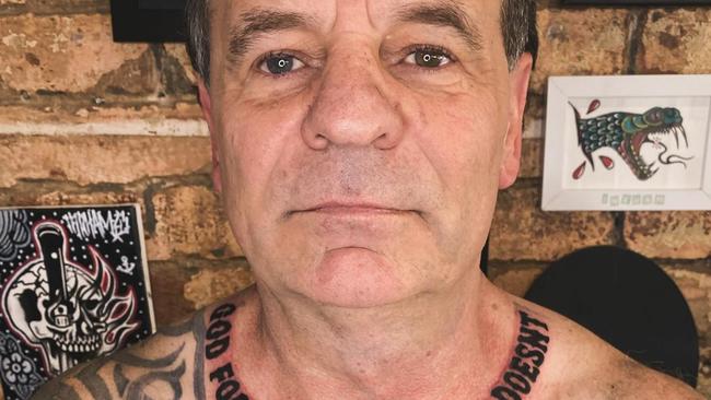 Former CFMEU boss John Setka shows off new ink with a tattoo reading, God Forgives The CFMEU Doesn’t, on his neck. Supplied