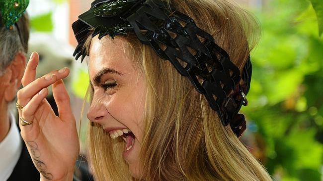 We have no idea what the joke is, but we want to be in on it! Picture: Splash