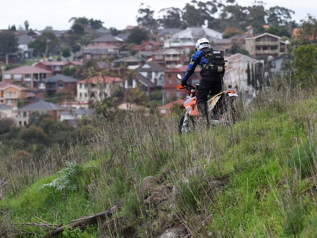 Police on dirt bikes search along the Maribyrnong River Trail. Picture: AAP Image/Tracey Nearmy