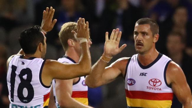 Taylor Walker of the Crows celebrates a goal with Eddie Betts. Picture: Scott Barbour/Getty Images