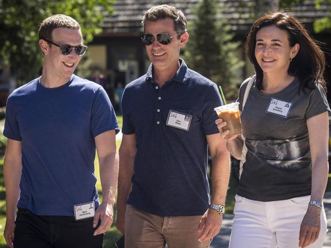 Facebook founder Mark Zuckerberg with Dan Rose, vice president of partnerships and platform marketing, and Sheryl Sandberg, chief operating officer. Picture: David Paul Morris