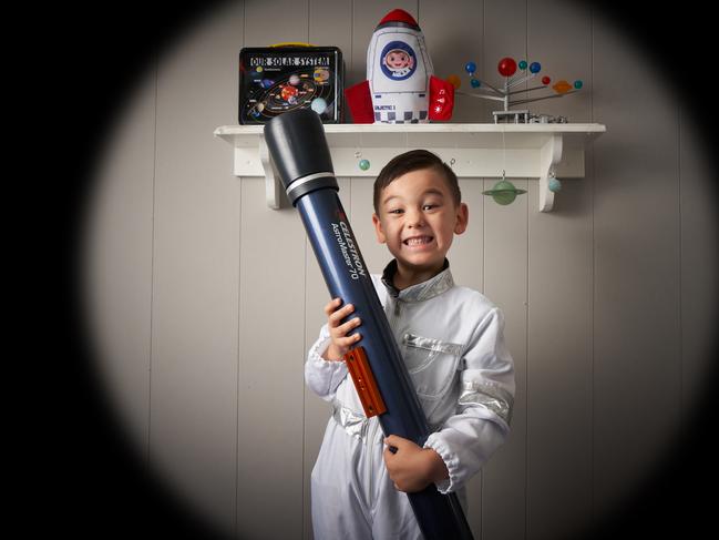 Charlie, 5 poses for a picture at home in Smithfield, where he wrote to one of AustraliaÕs top astrophysicists, Australian Academy of Science Fellow, Professor Elaine Sadler, to find out why Pluto was demoted to a dwarf planet.  Saturday, Feb. 1, 2020. Picture: MATT LOXTON