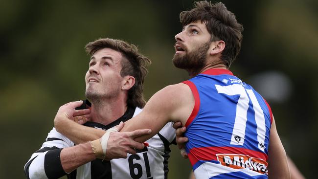 Michael Hartley, left, will launch his coaching career with Castlemaine. Picture: Martin Keep