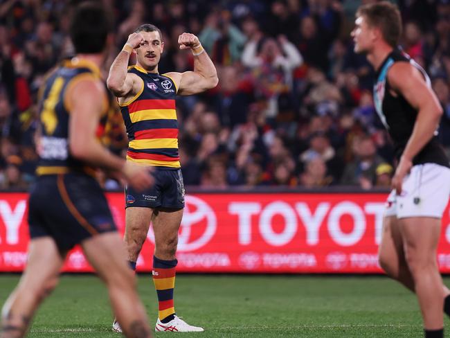 ADELAIDE, AUSTRALIA - JULY 29: Taylor Walker of the Crows celebrates a goal during the 2023 AFL Round 20 match between the Adelaide Crows and the Port Adelaide Power at Adelaide Oval on July 29, 2023 in Adelaide, Australia. (Photo by Sarah Reed/AFL Photos via Getty Images)