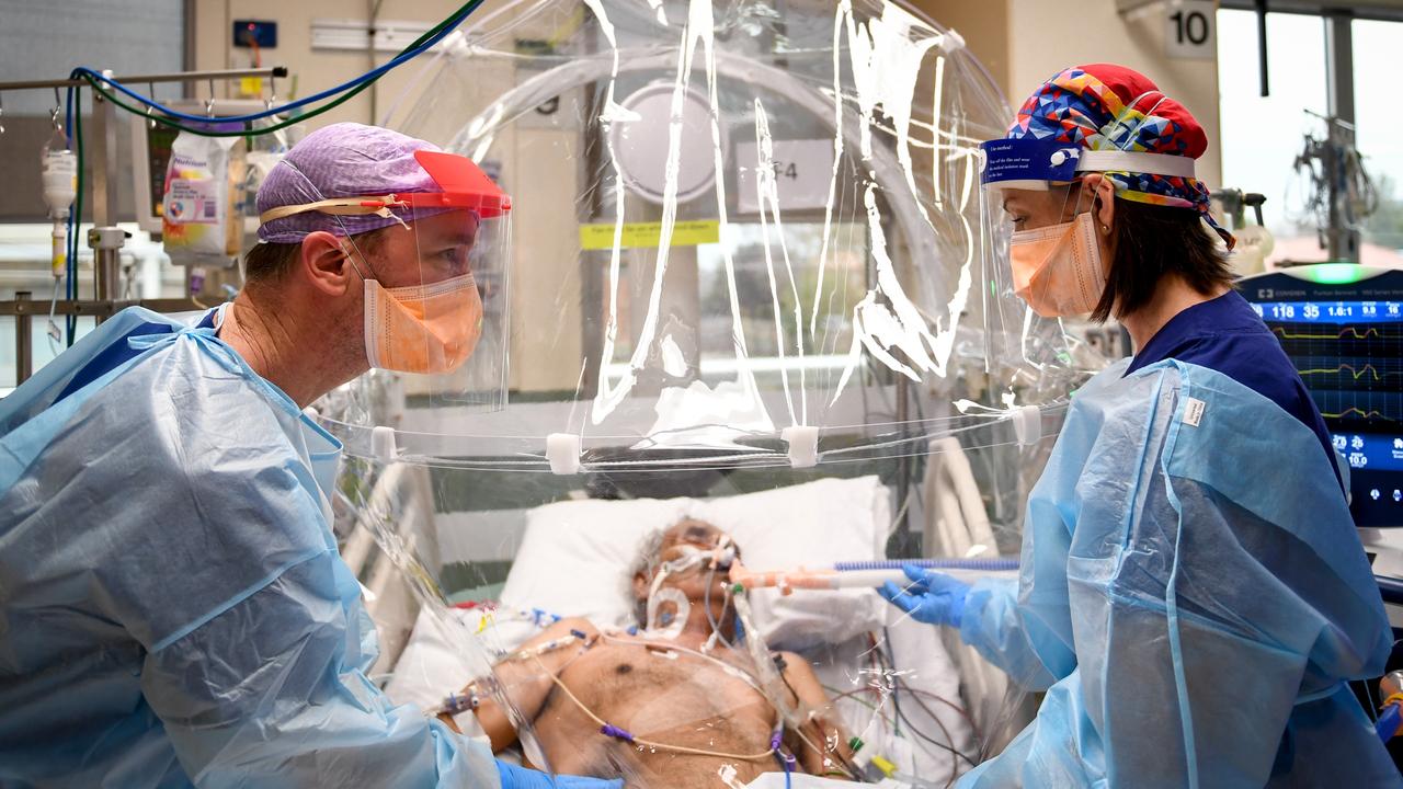 A doctor and nurse attend to a COVID patient at Footscray Hospital in Melbourne in July. Picture: Penny Stephens.