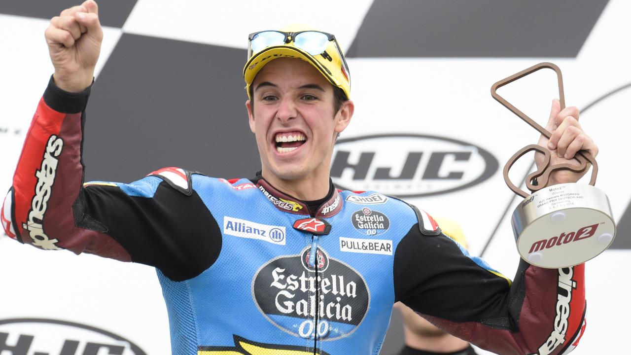Alex Marquez celebrates his victory in the Moto2 race during the winners ceremony in Germany. Picture: AP